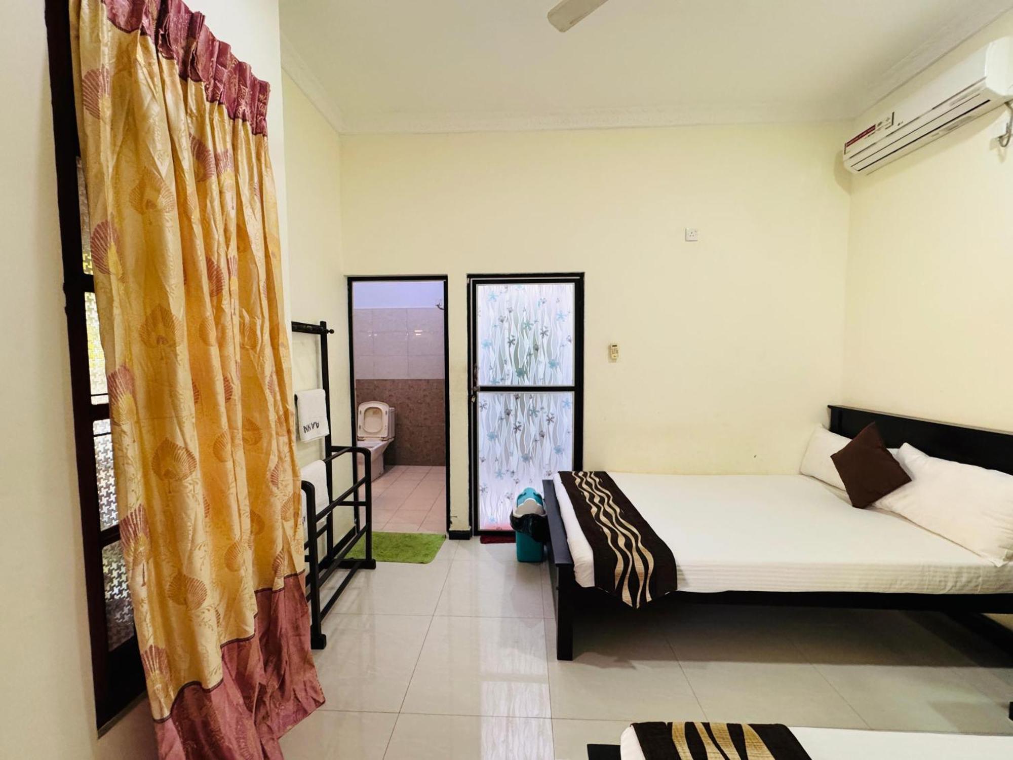 Aa Inn Trincomalee Kamer foto
